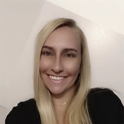 A headshot of Katelyn Deer, the Front Desk Coordinator at The Gulf Coast Family Chiropractic.